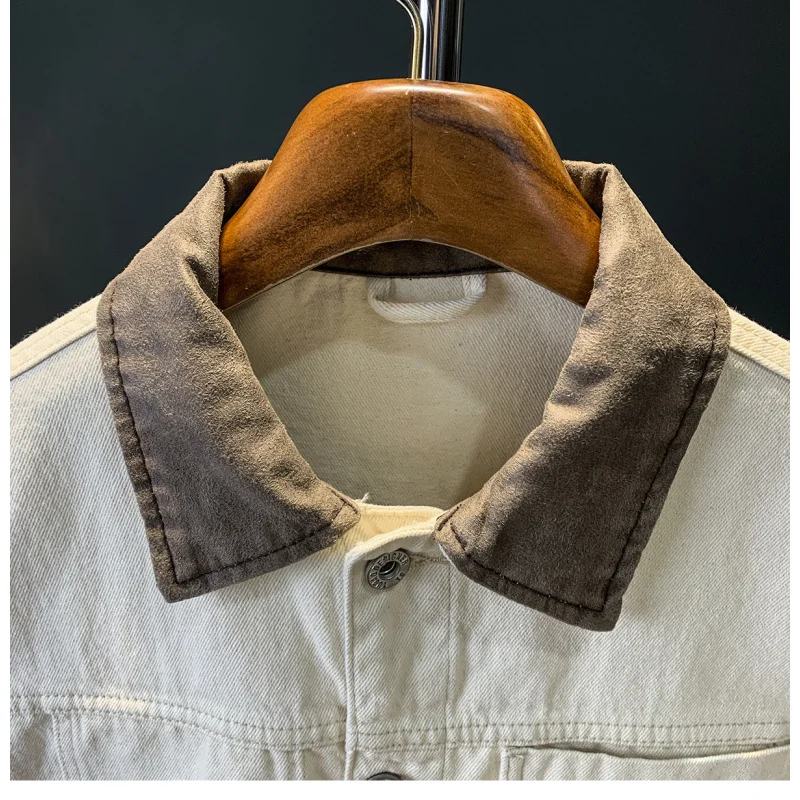 

Autumn men's denim jacket with trendy splicing and contrasting colors, featuring a loose and washed denim jacket for casual wear