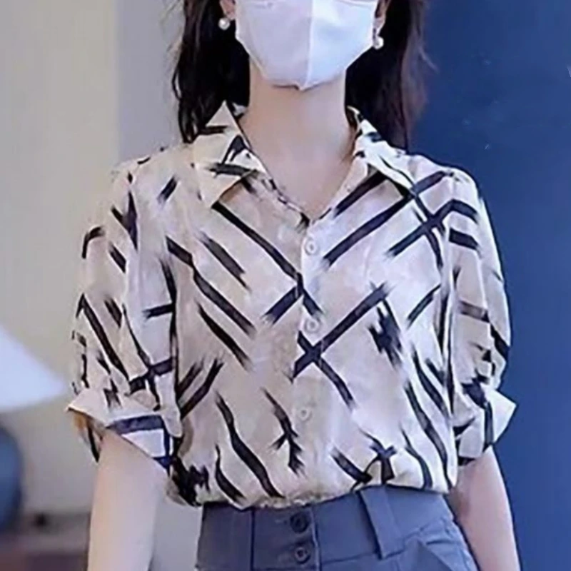 2024 New Korean Commuter Minimalist Fashion Loose Short Sleeved Blouses Polo Collar Printed Stripe Button Women\'s Shirt Top