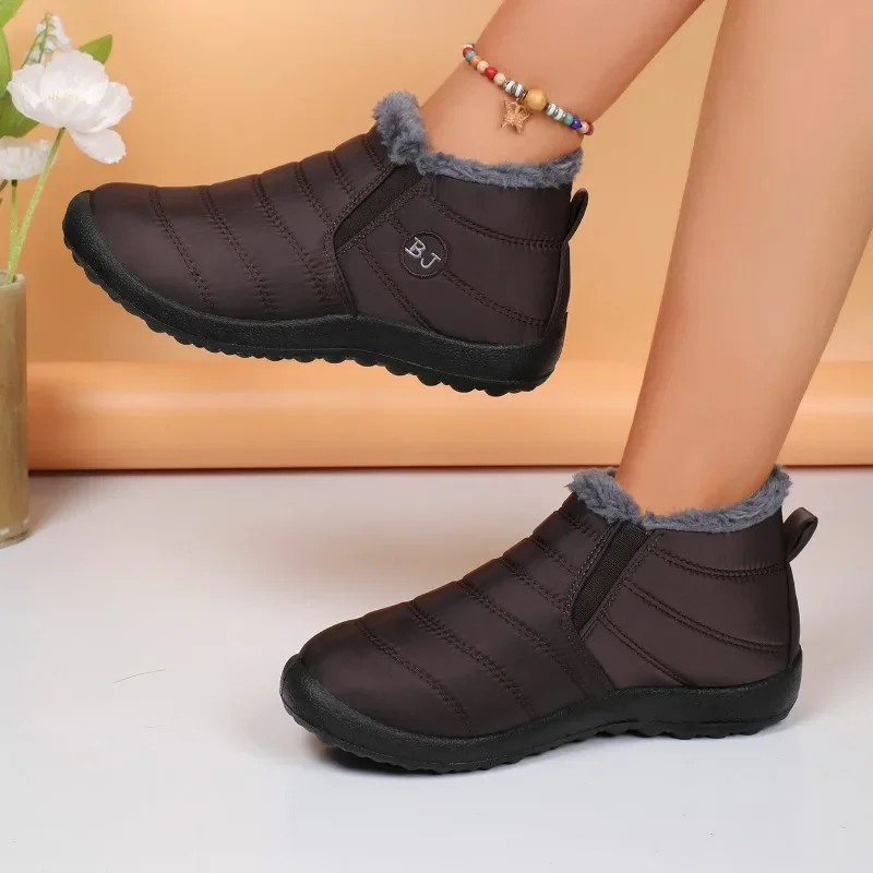 Frauen wasserdichte Stiefel neue Winter Plüsch Schneeschuhe Frauen Stiefeletten warmes schwarzes Paar Baumwolle Paare Plateaus chuhe