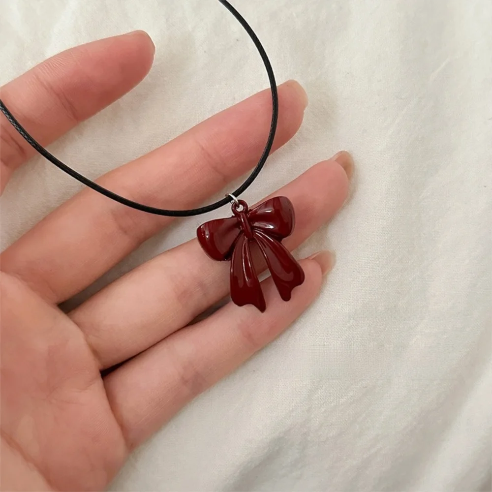 Y2K الجلود حبل Bowknot قلادة القلائد القوس الإبداعية الأحمر الأسود الجلود حبل سترة سلسلة للنساء الفتيات