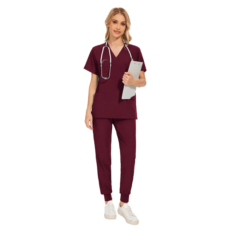 Uniformes quirúrgicos de manga corta con cuello en V para mujer, ropa de trabajo con bolsillo para enfermera, dentista, uniformes médicos, traje Exfoliante para clínica