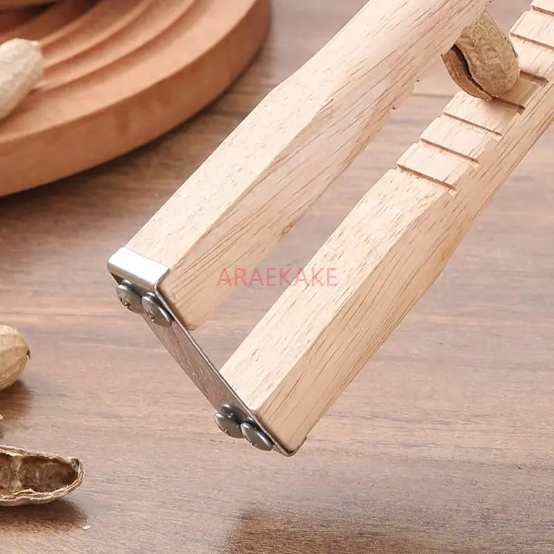 Picture 7: 1pcs Household Peanut Shell Peeling Artifact Hand Peeling Peanut Clip Size Raw Peanut Shell Peeling Tool