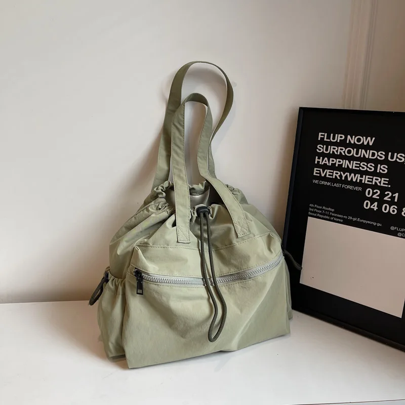 

2025 повседневные однотонные тканевые сумки на плечо большой вместимости, простые универсальные модные портативные популярные сумки для женщин