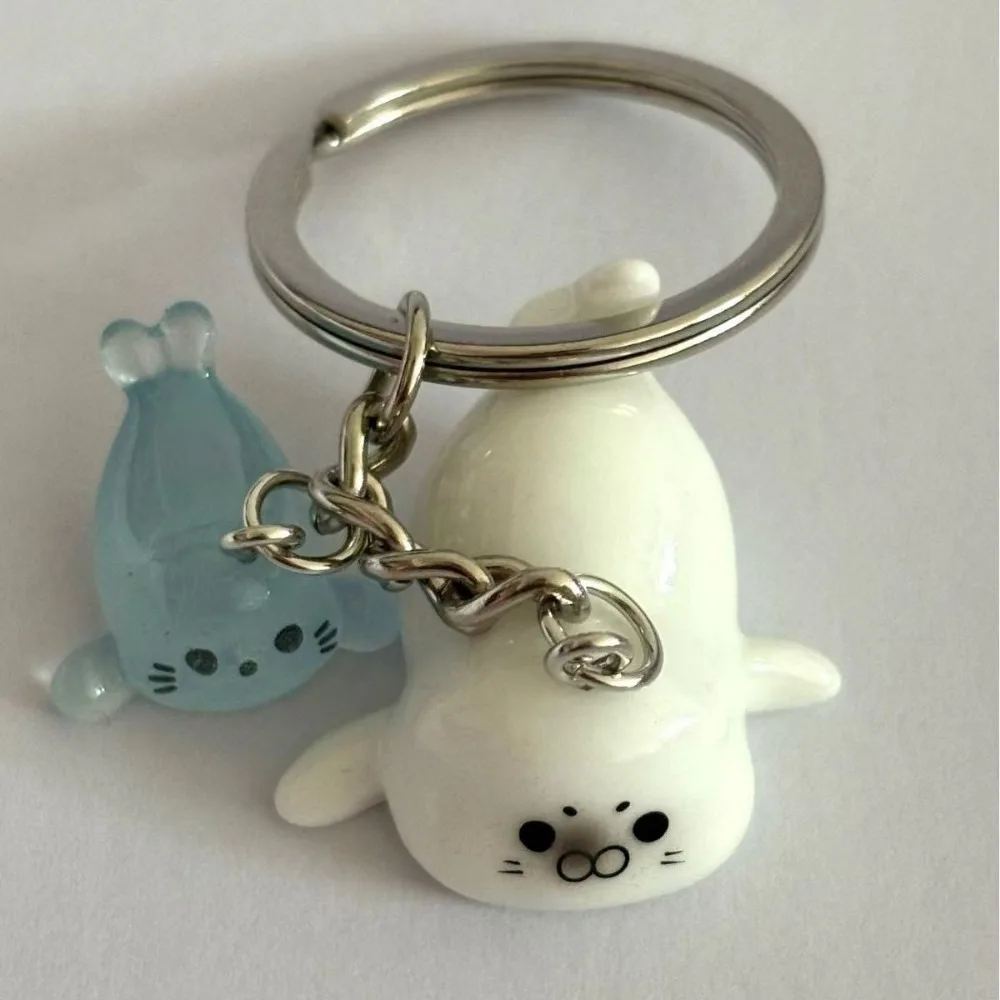 Креативный-3d-брелок-в-виде-морского-льва-подвеска-для-сумки-из-смолы-светящийся-брелок-держатель-для-ключей-для-девочек