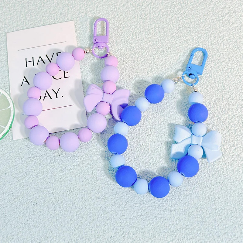 الوردي اللؤلؤ القوس المفاتيح مطرز قلادة مكافحة خسر حبل الهاتف المحمول سلسلة سماعة حقيبة سيارة المفاتيح حقيبة الظهر التبعي