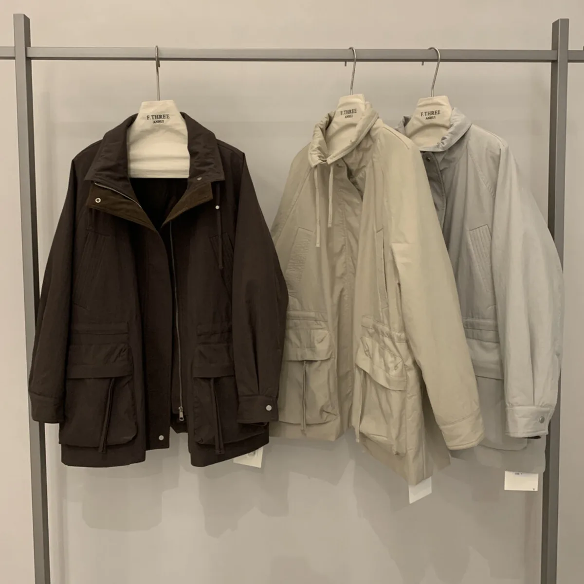 KWTX 2025 Damska kurtka robocza, nowy styl, blok kolorów, pogrubiona, wiązana w pasie, kieszenie na zamek, casualowa, designerska, jesień-zima