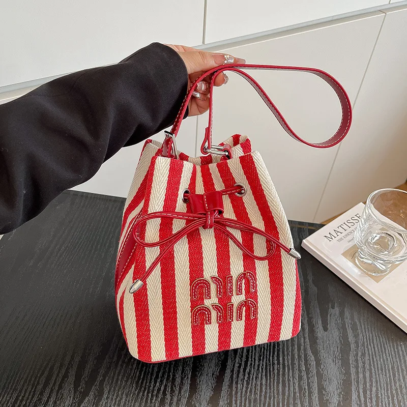 

"SS2025 Морская сумка Lucky Pouch | Ковш-ведро Breton со съемным ремнем - Studio Edition Canvas Crossbody Utility Chic" ​