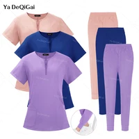 Nuevos uniformes quirúrgicos médicos, conjunto exfoliante para mujer, ropa de trabajo para salón de belleza, bata clínica, pantalones con bolsillo superior, traje de enfermería con cremallera para médico veterinario