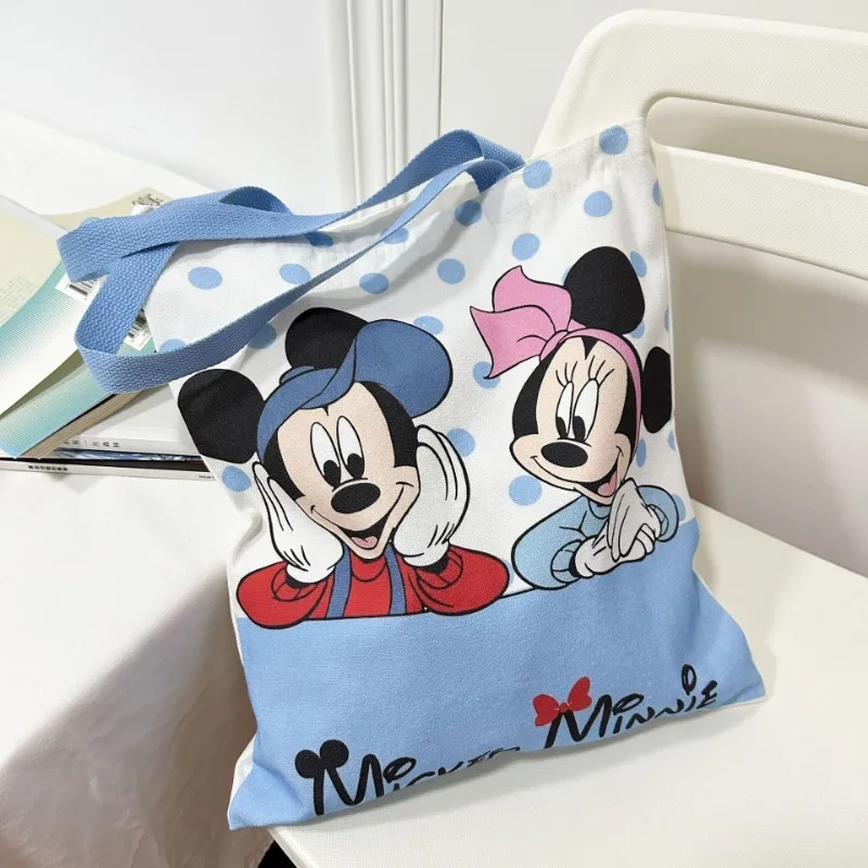 Nuevo bolso de mano con estampado creativo de dibujos animados de Mickey y Minnie de Disney, bolso de lona de gran capacidad a la moda para mujer