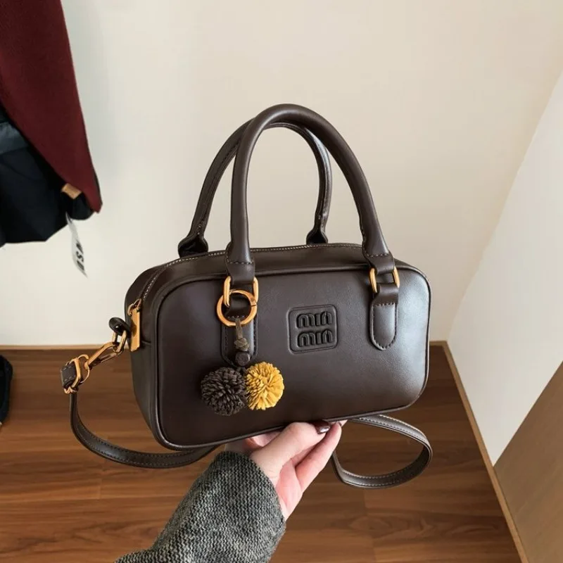 

Элегантная повседневная дизайнерская сумка для подгузников для женщин, сумка через плечо, роскошная кожаная сумка-тоут, большая вместимость, уникальный логотип с буквами, простой дизайн