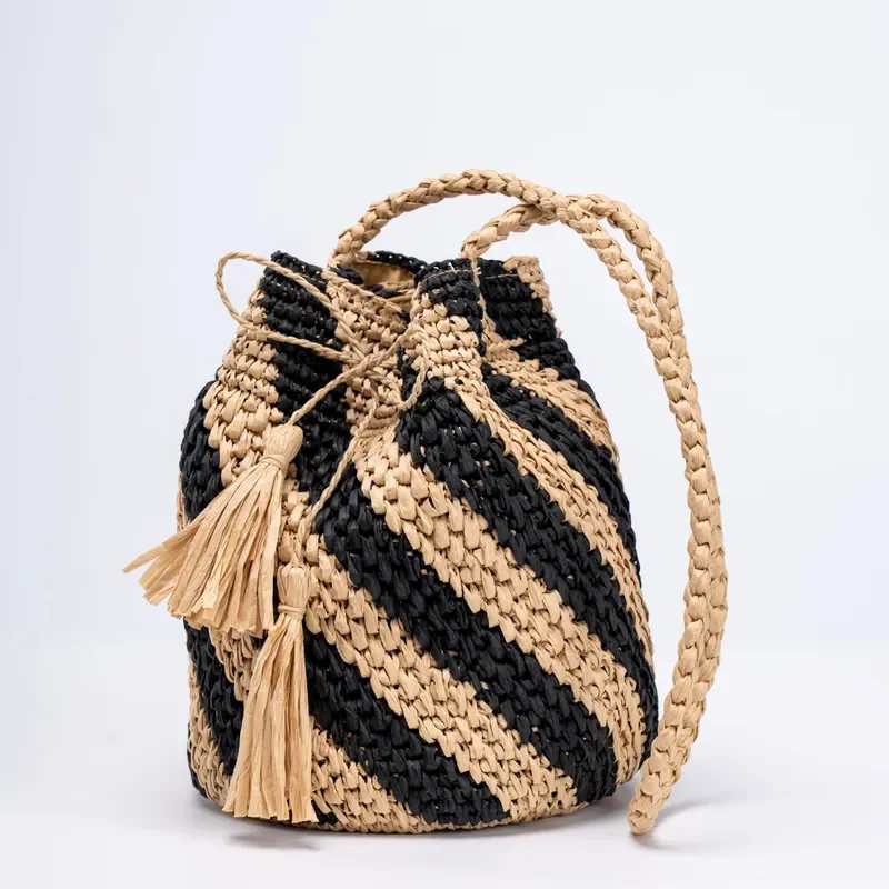 Striped straw handwoven messenger bag for women with contrasting details beach holiday shoulder bag lightweight summer view 2