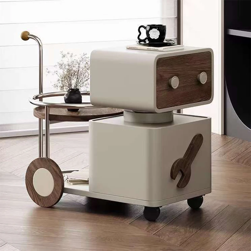 

Минималистичная тележка, край дивана, несколько подвижных гостиных, милый мультяшный боковой шкаф, кремовый ветер