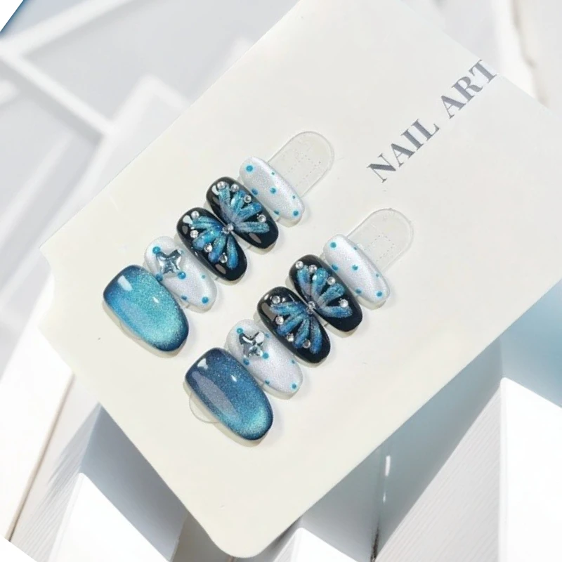 

10Pcs Ocean Blue Press-On Nails Dazzling Glitter Cat Eye Effect Oval Handmade Nails with Polka Dots&Butterfly Accents Nail Art