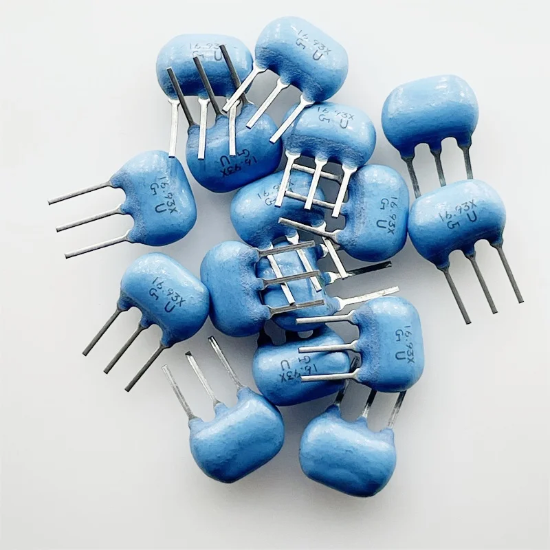 50PCS/ 16.9344M original ceramic crystal oscillator CST16.93MXW 16.9344MHZ straight plug 3 feet in stock