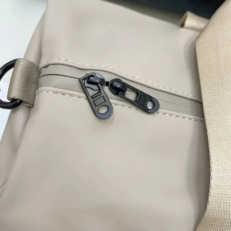 Sacs de voyage de luxe de grande capacité, sacs de voyage High Street, conception de marque, poignée supérieure, dos sec, séparation, logo lettre 3D en relief, 24 synchronisation