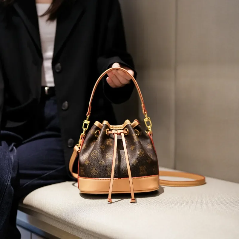 2026 New Vintage Monogram Drawstring Bucket Versatile Fashionable Women's Handbag Color-Block Commuting Shoulder Crossbody Bag