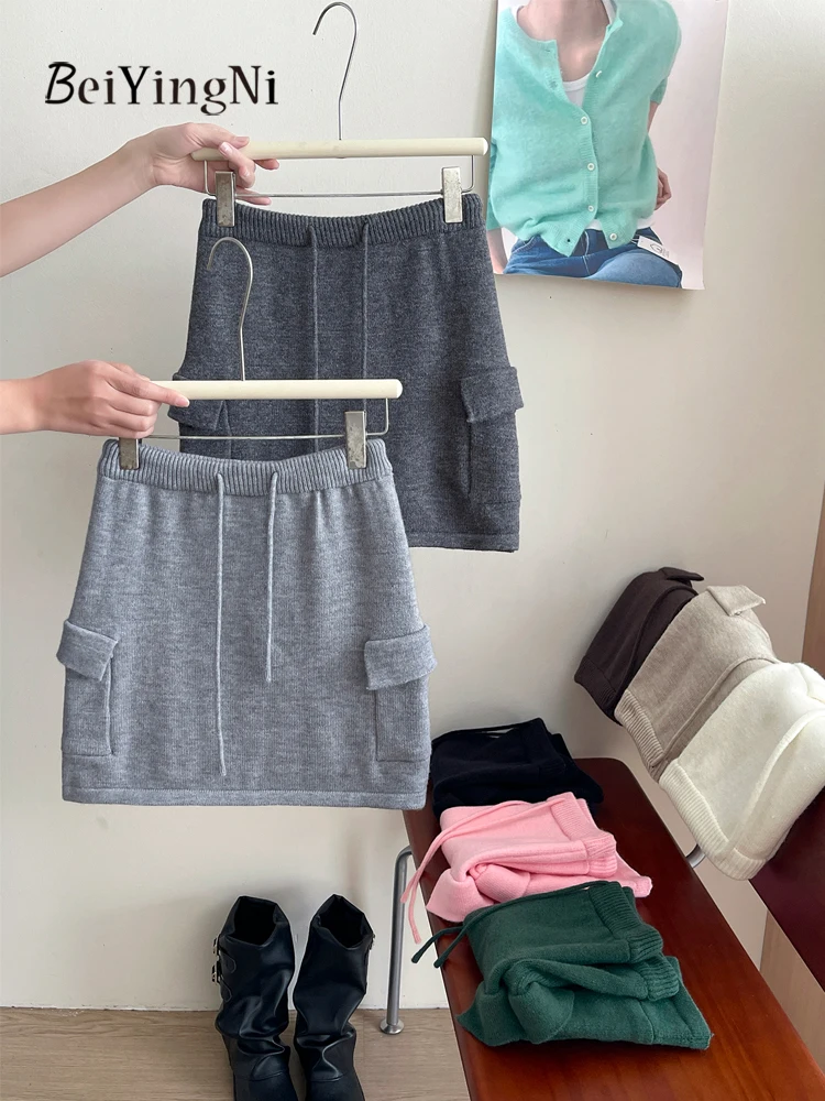 Beiyingni nova moda de malha cintura elástica mini saia feminina coreano bolsos lápis saias curtas senhora simples inverno magro jupes