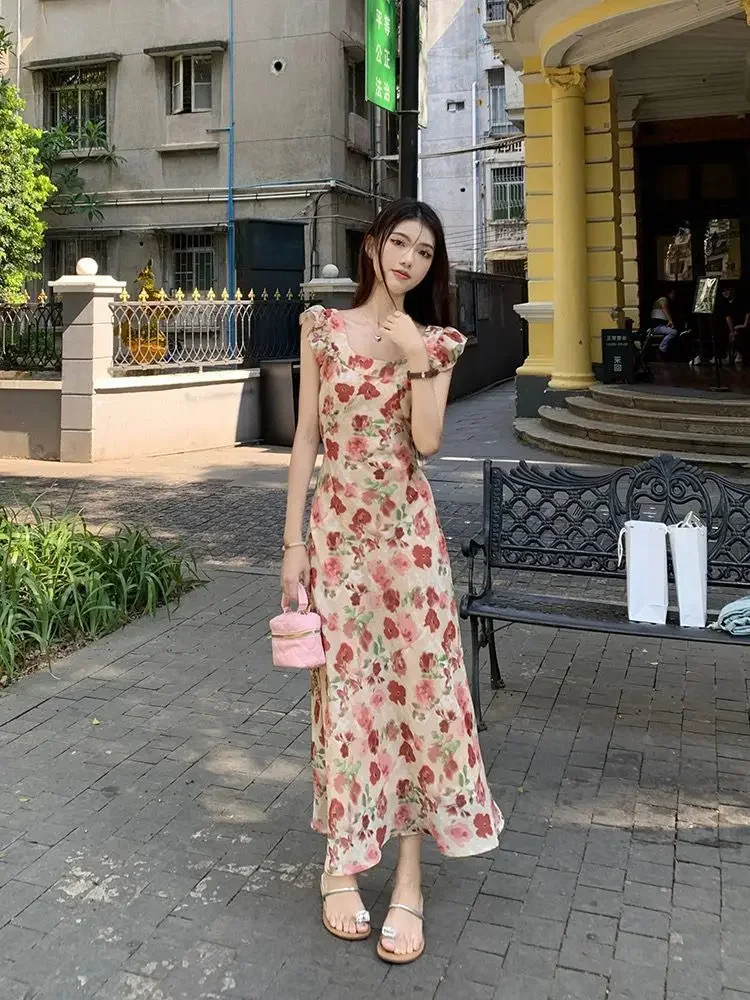 Abito femminile con fasciatura aperta sul retro Abito floreale midi da donna Fiore senza schienale Nero Moda Estate 2025 Abiti curvy Festa elegante