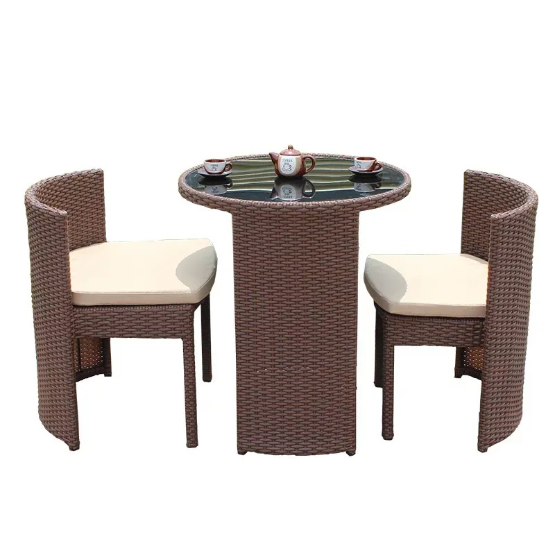 

Outdoor rattan chair table and chair three-piece balcony garden creative simple rattan leisure table and chair combination