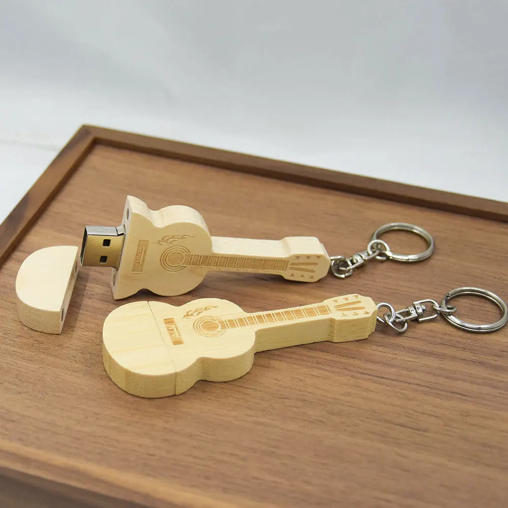 แฟลชไดรฟ์ไม้รูปกีตาร์ สลักโลโก้ฟรี ความจุ 128GB 64GB 32GB ความจุจริง 100% ของขวัญสุดสร้างสรรค์พร้อมสายคล้อง