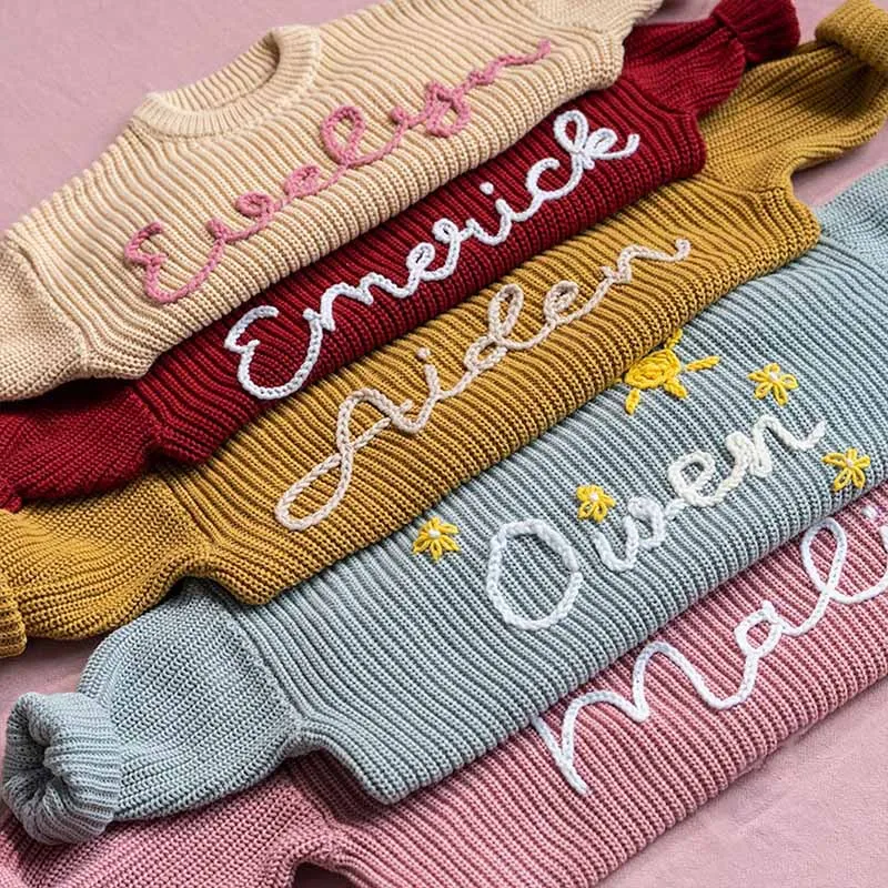 Personalized sweaters for cherished babies.Celebrate your little one's name with unique, custom-made thick knitted sweaters