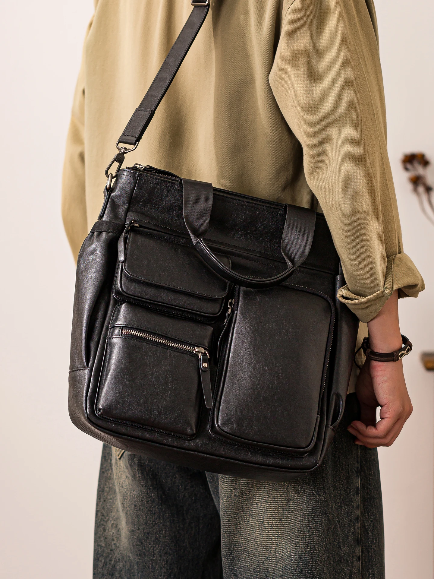 

PNDME casual daily work first layer cowhide men's black handbag outdoor commuting cow leather multi-pocket file shoulder bag