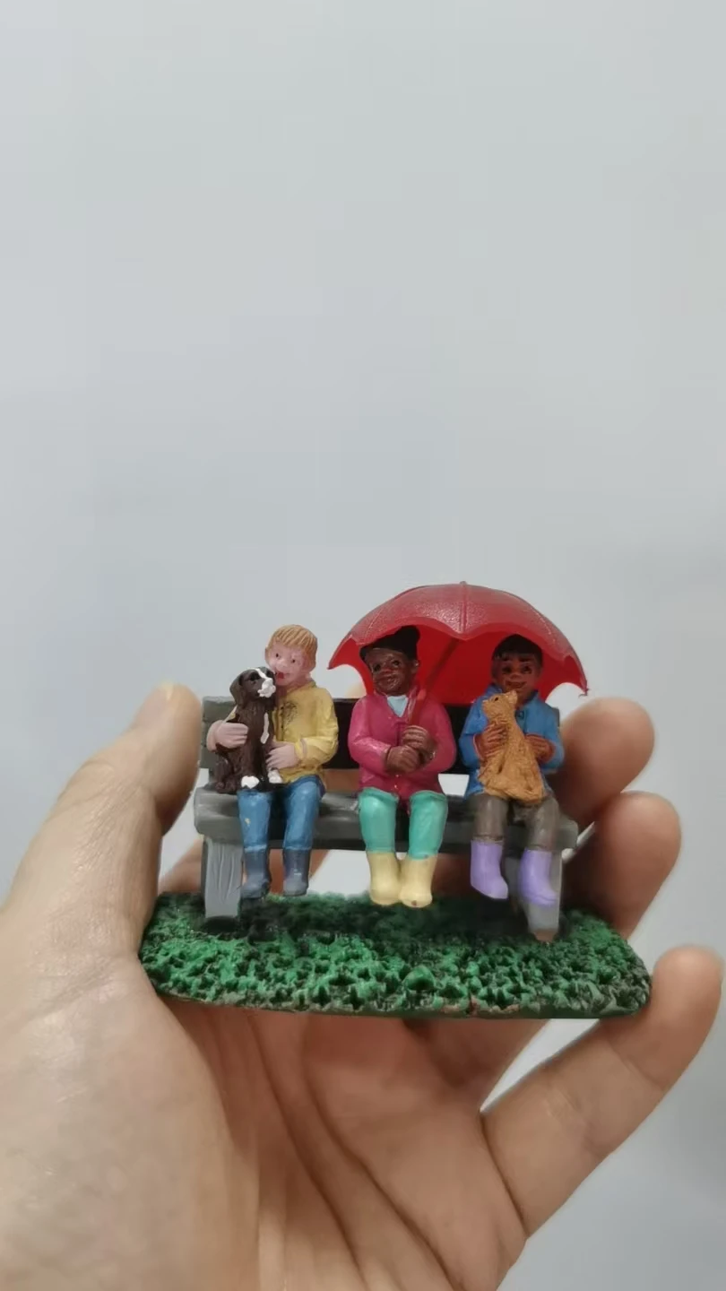 resin figure mental psychological sand table game box court therapy  child children sitting  on  chair  with  dog  and  umbrella