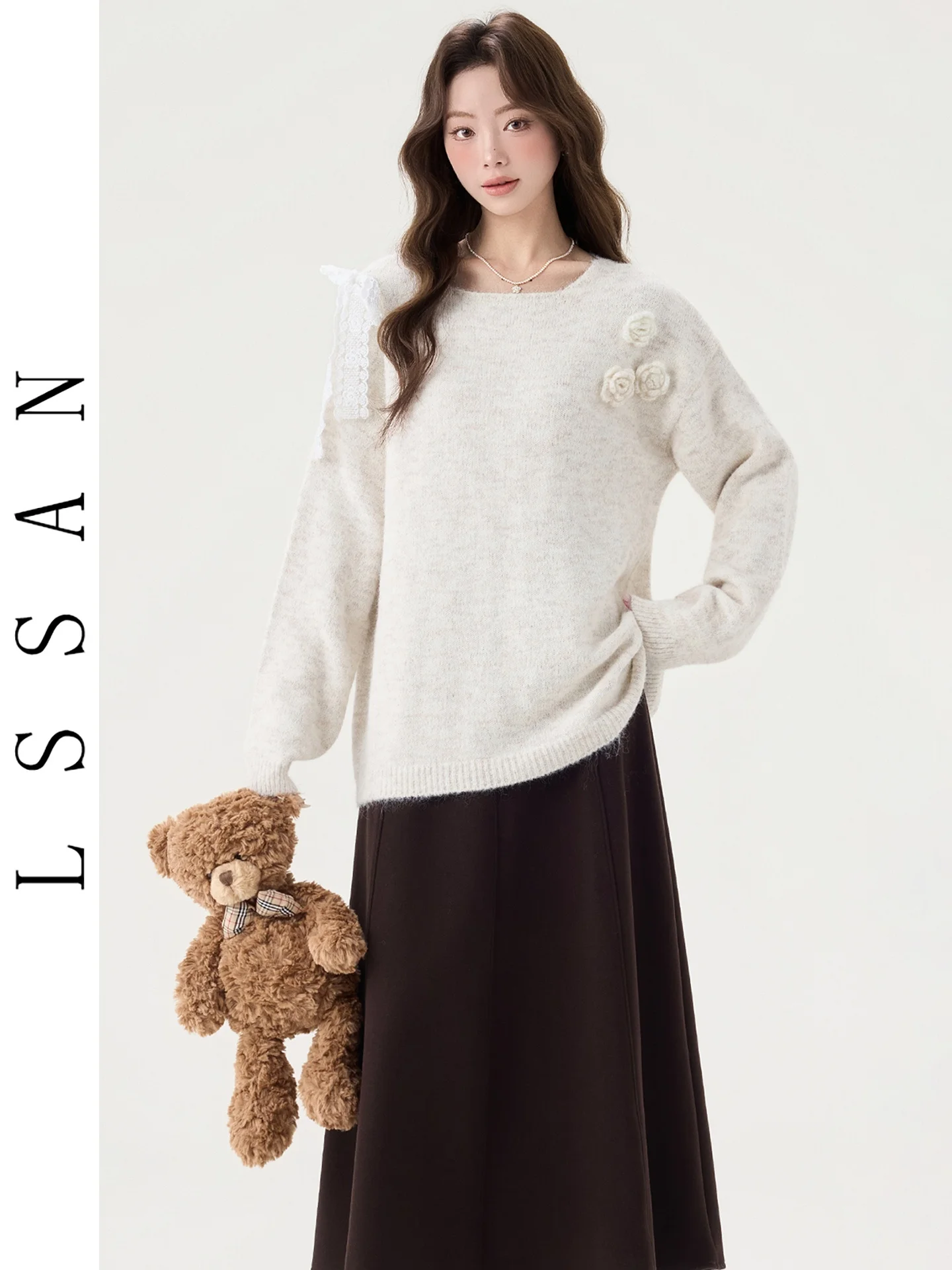 

Женский корейский вязаный комплект: свитер с бантом и юбка с высокой талией свободного кроя. Модная повседневная одежда для осени и зимы.