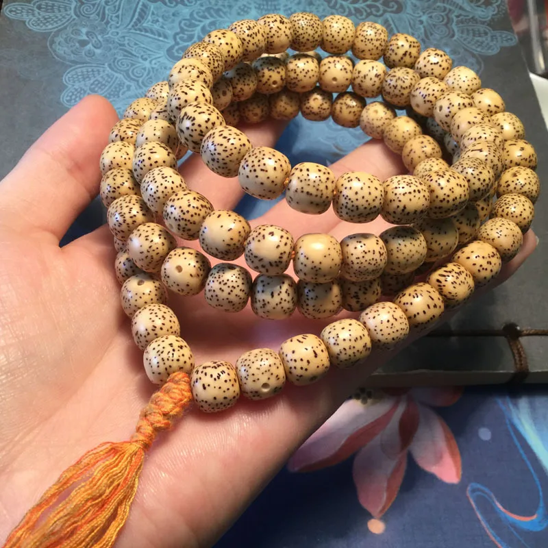 

Hainan Bodhi Gold Seed 108 Beads Dry Polished Non-Greasy Moon Bracelet