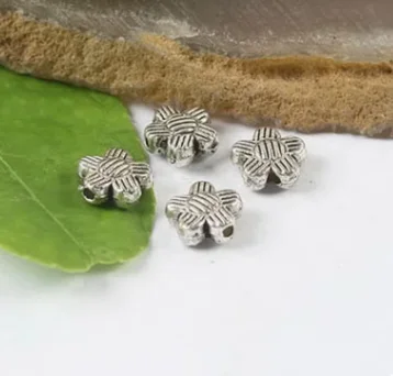 

30pcs 8mm ,hole 1.1mm Alloy matel charms tibetan silver 2-sided flower spacer beads HWH0094