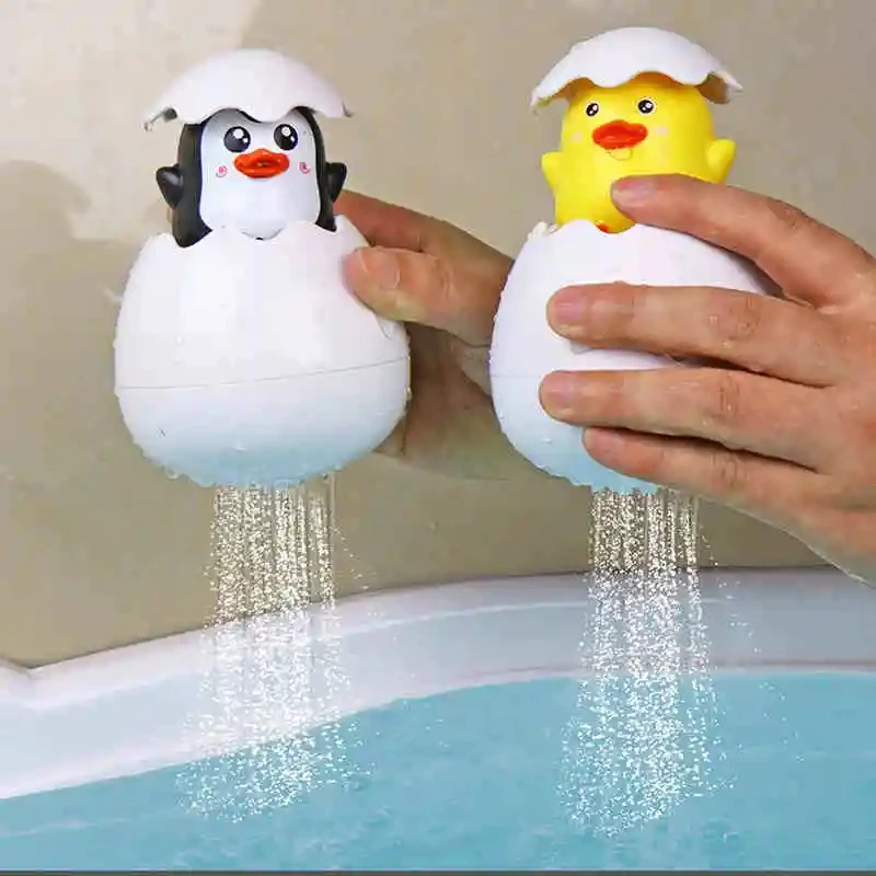 Jouet de bain pour bébé, pulvérisateur d'œufs de pulvérisation d'eau de canard, jouet animal de pulvérisation d'eau interactif flottant pour natation et bain d'enfants
