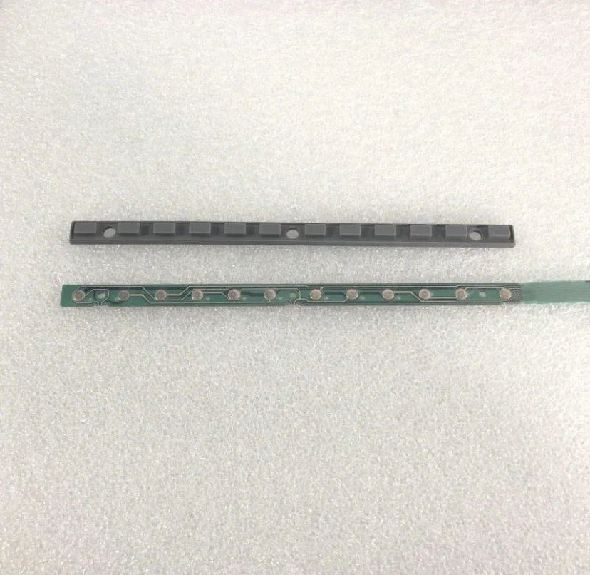 

A new set of Series 21i-T console button strips