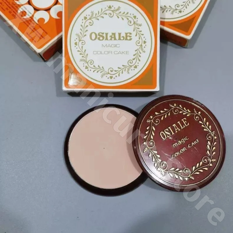 แป้งฝุ่นเซ็ตติ้งแต่งหน้า ตราไทยโอเซียเล่ สีชมพูเขียว ช่วยให้ผิวกระจ่างใส เนื้อเนียนละเอียด ปกปิดเรียบเนียน ติดทนนาน 12 กรัม