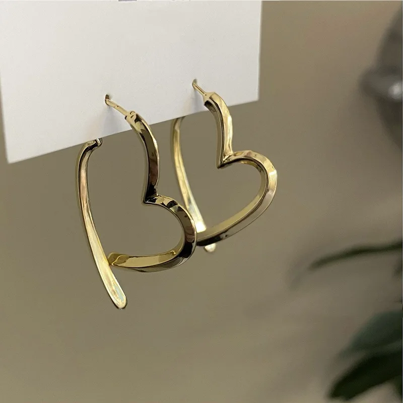 مزاجه بسيط غير النظامية القلب هندسية الأقراط s925 الفضة إبرة المرأة ارتداء اليومي مجوهرات الأزياء