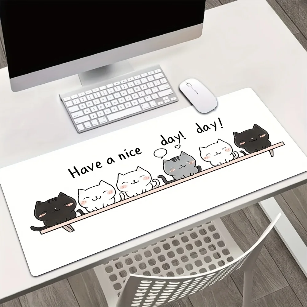 

Cat-patterned mousepad with an anti-slip rubber is a large office and home desktop mat suitable for e-sports and leisure use