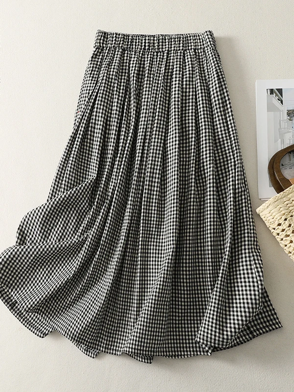 

Черно-белая клетчатая юбка А-силуэта для женщин больших размеров: модный дизайн, свободный крой, средней длины, в корейском и японском стиле