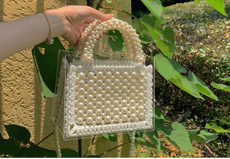 Pure hand-beaded Pearl Shoutibaoyakeli 2019 new fashion temperament women\'s single shoulder oblique span knitting bag