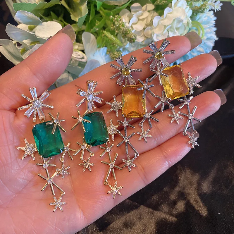 

Women S925 Silver Needle Fashion Flying Snowflake Earrings Female Topaz Personality Creative Designer Earrings