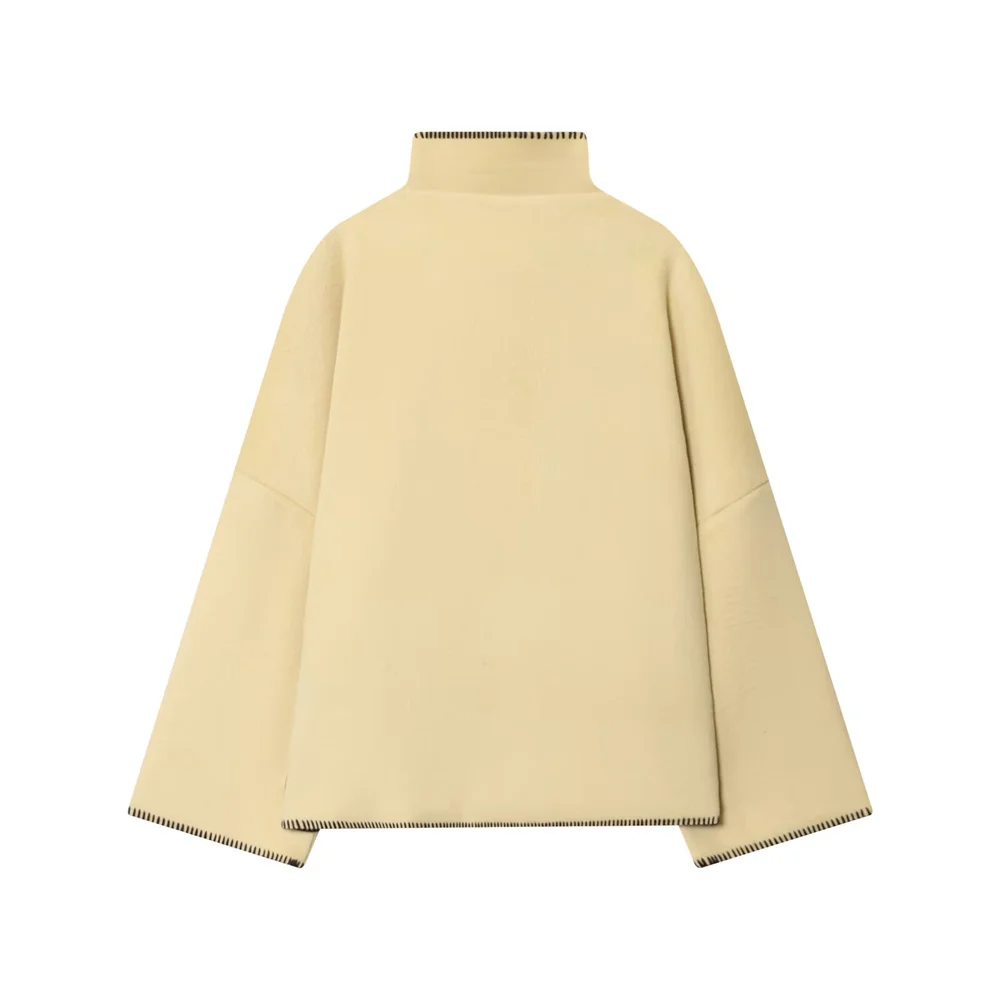 Nowa kolekcja damska na jesień i zimę: retro kurtka z kieszeniami, z temperamentem, luźna, odmładzająca, ze stójką i ozdobnymi wstawkami.