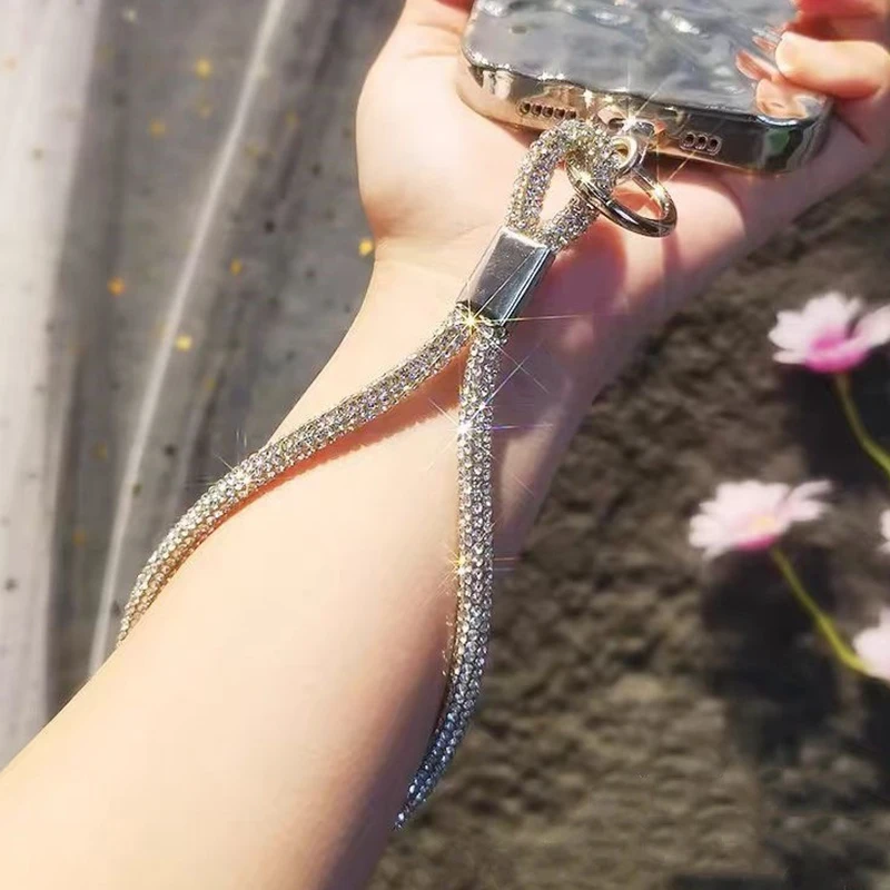 Brelok do telefonu z brokatem, błyszczącymi cyrkoniami, smycz do telefonu, diamentowy kryształowy pasek na nadgarstek, zawieszka do kluczy, sznurek zapobiegający zgubieniu