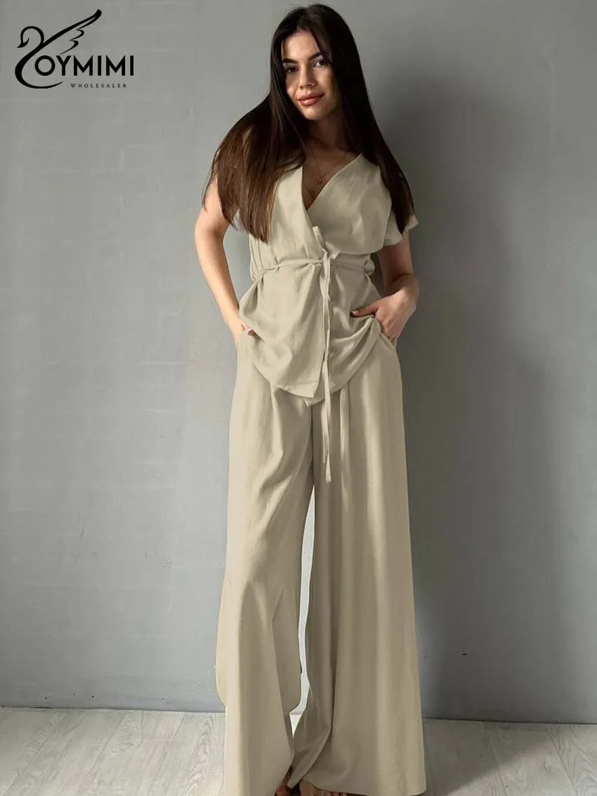 

Женский комплект Oymimi из двух предметов цвета хаки, весна 2026: топ с V-образным вырезом, коротким рукавом и завязками на талии, широкие брюки. Модный повседневный офисный наряд для женщин.