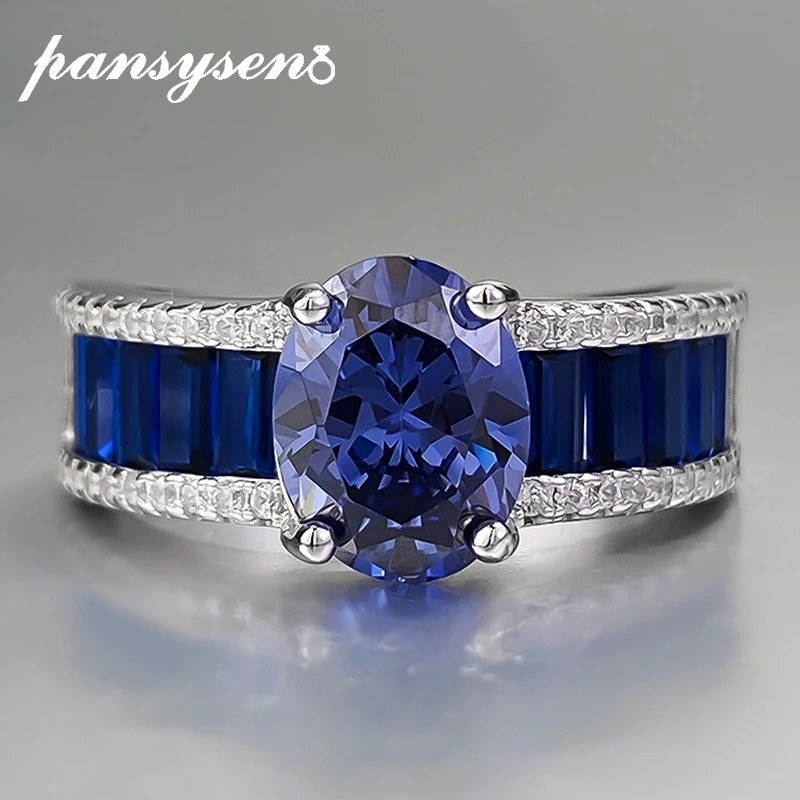 

PANSYSEN 100% 925 Sterling Silver 3CT Oval Cut Tanzanite High Carbon Diamond Rings for Women Man Anniversary Party Fine Jewelry