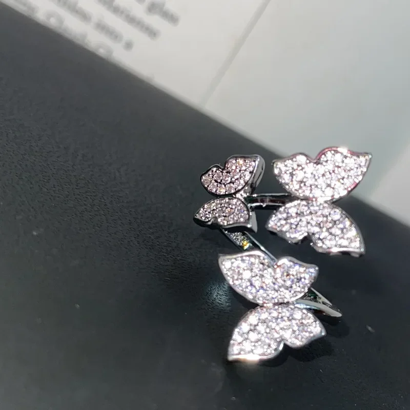 

MDLFES Moissan Diamond Style Micro-set Brilliant Zirconium 3 Butterfly Loose Ring Women Netflix Live