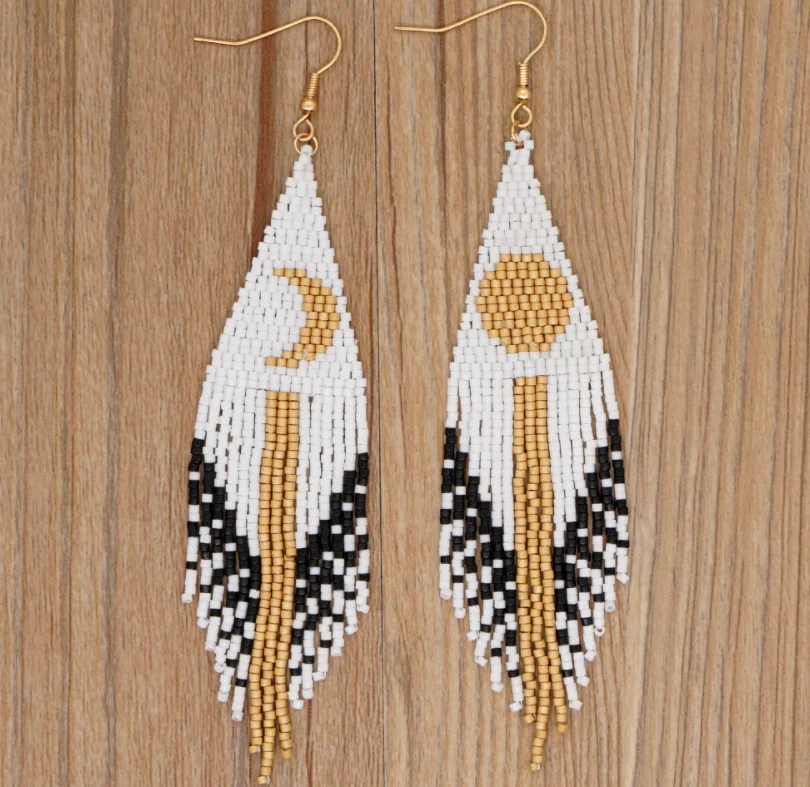 Beaded earrings Moon symmetry Design Originality Tassel Hand knitting Bohemia Alloy Tide Simple Rice bead earrings