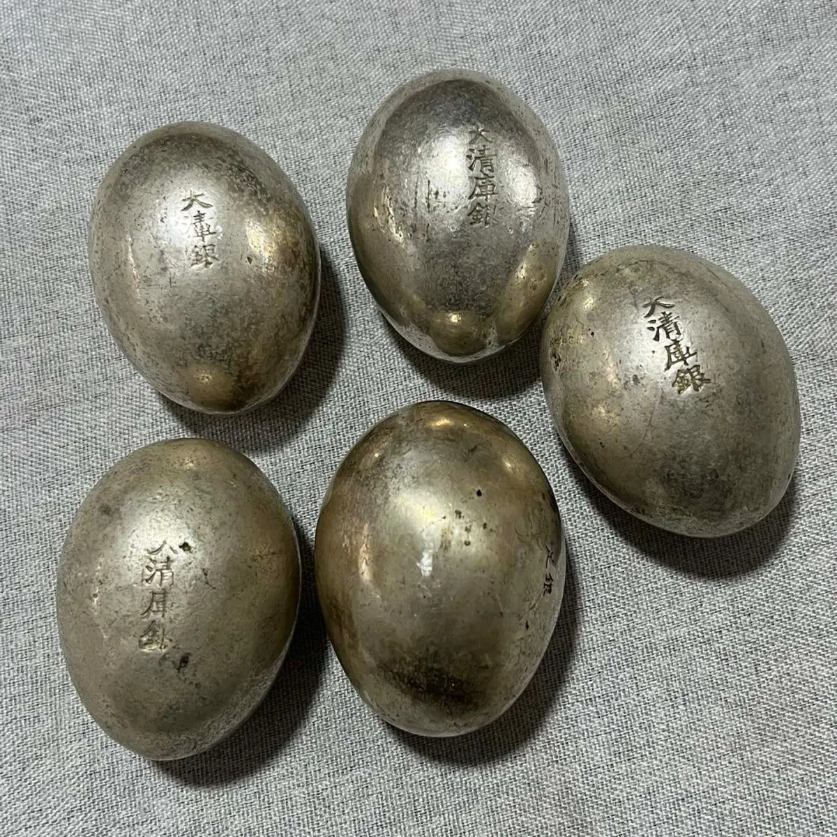 During the Qianlong period of the Qing Dynasty silver ingots were made and silver eggs were randomly welded