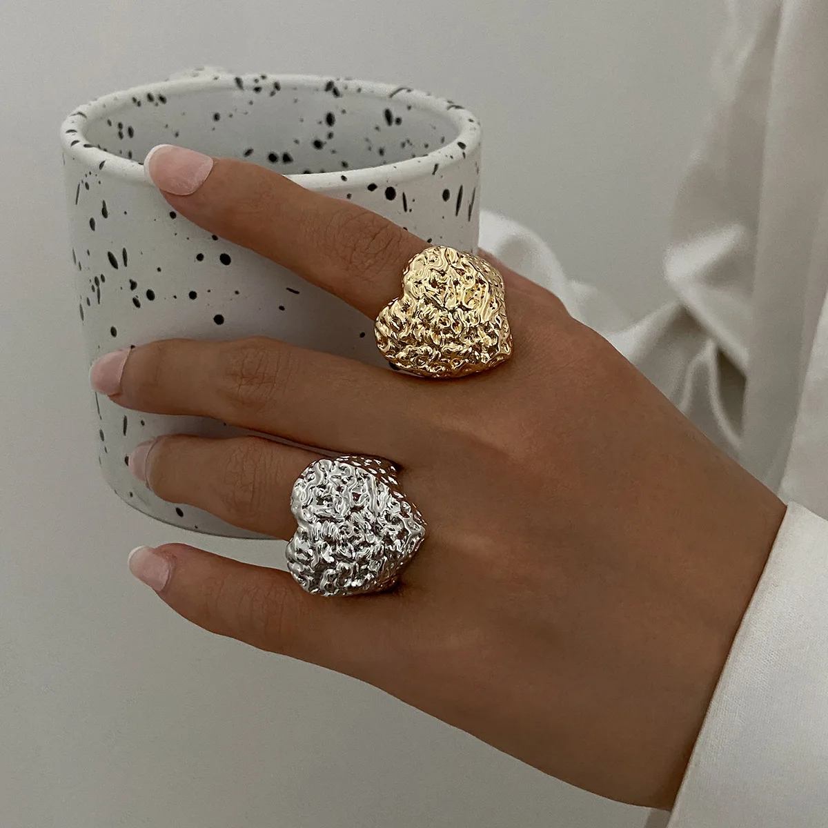 

Inspired Liquid Metal Pleated Love Ring, Featuring A Minimalist Landscape Surface with A Heart-shaped Design