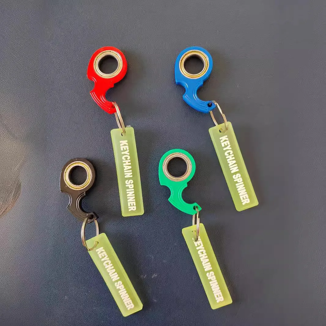 Popular llavero giratorio con yema del dedo Karambit Spinner de segunda generación