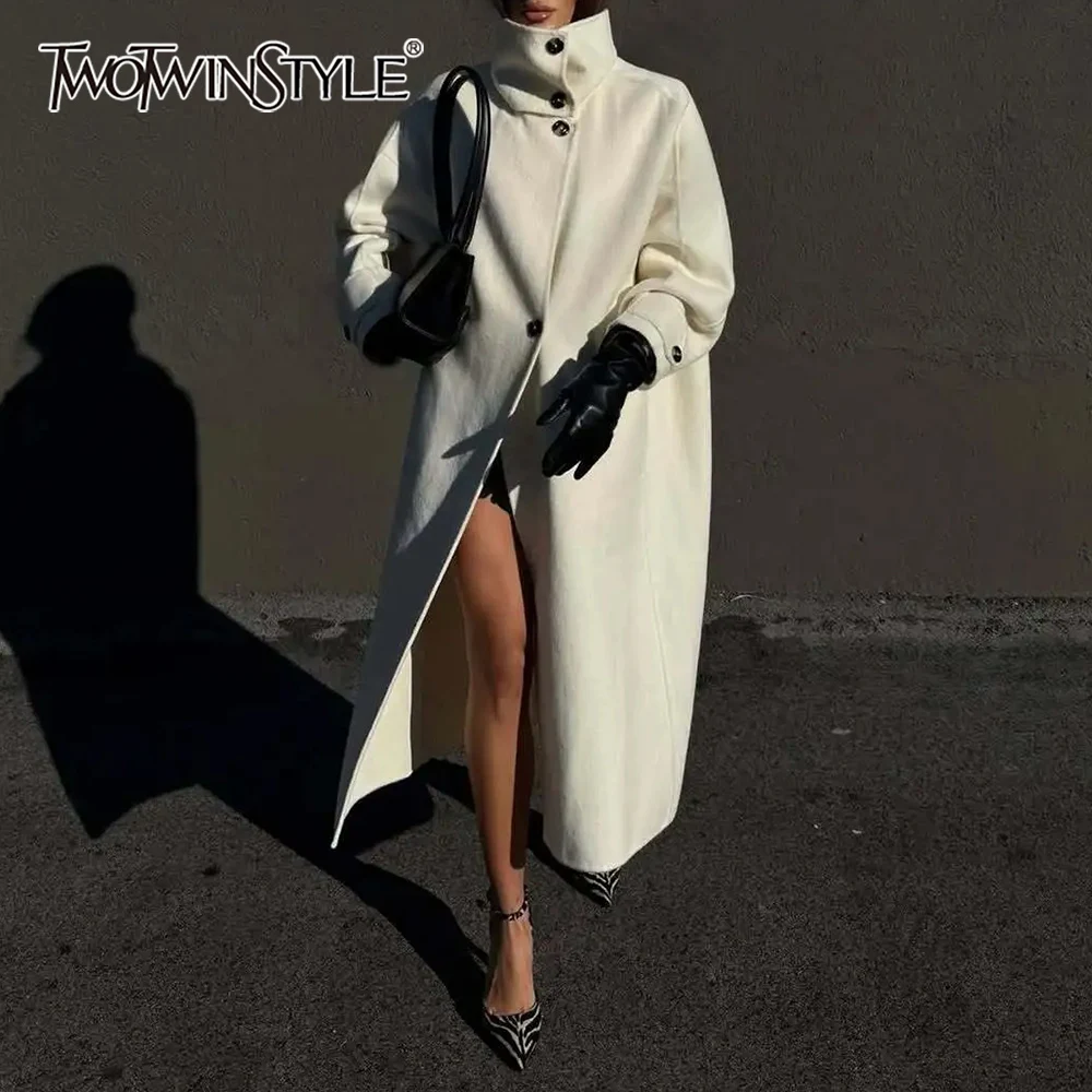 

TWOTWINSTYLE Minimalist High End Style Windbreaker for Women Stand Collar Long Sleeves Loose Patchwork Button Slit Jacket Female