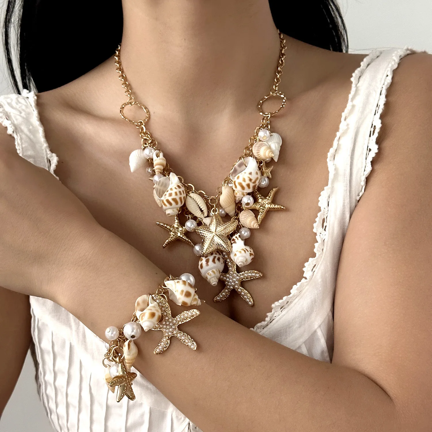 

Ocean Theme Shell Starfish Jewelry Set, Natural Conch Pearl Gold Chain Statement Necklace Bracelet Boho Beach Jewelry for Women