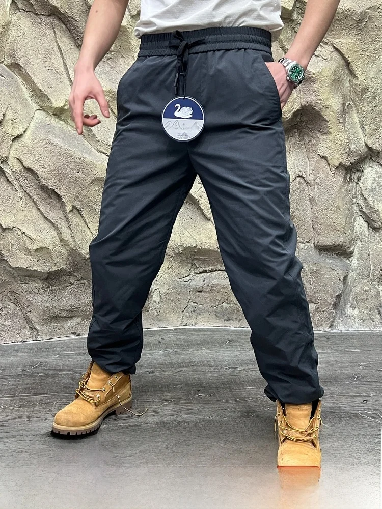 

Мужские легкие теплые пуховые брюки, повседневные молодежные длинные брюки, рабочая одежда, однотонное зимнее новое поступление